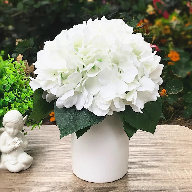 One of the easiest ways to display hydrangeas is in a vase on the table