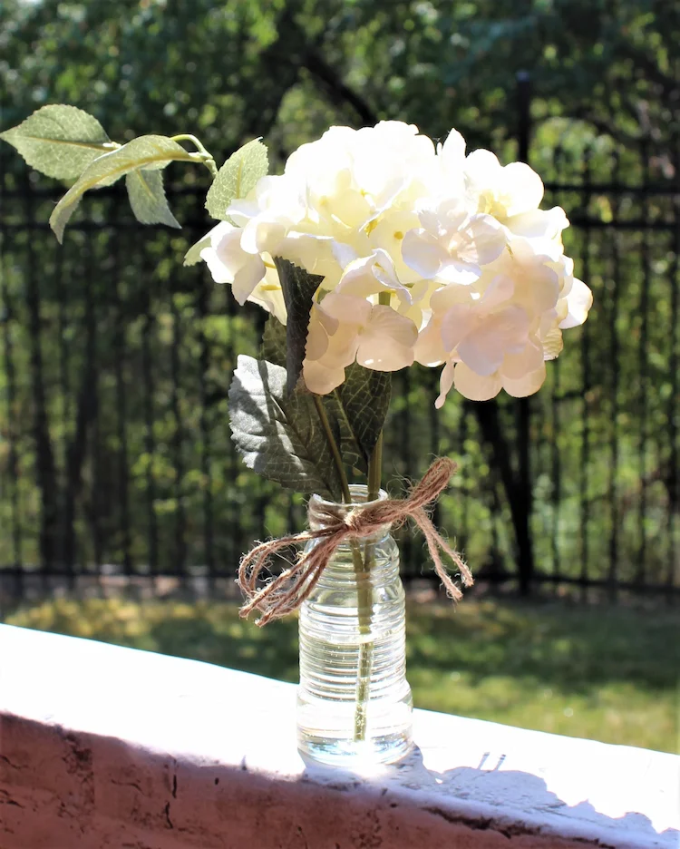 Use vintage bottles as vases to create a unique atmosphere