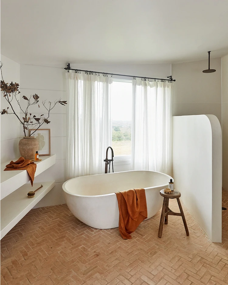 create a cozy atmosphere for a mediterranean bathroom