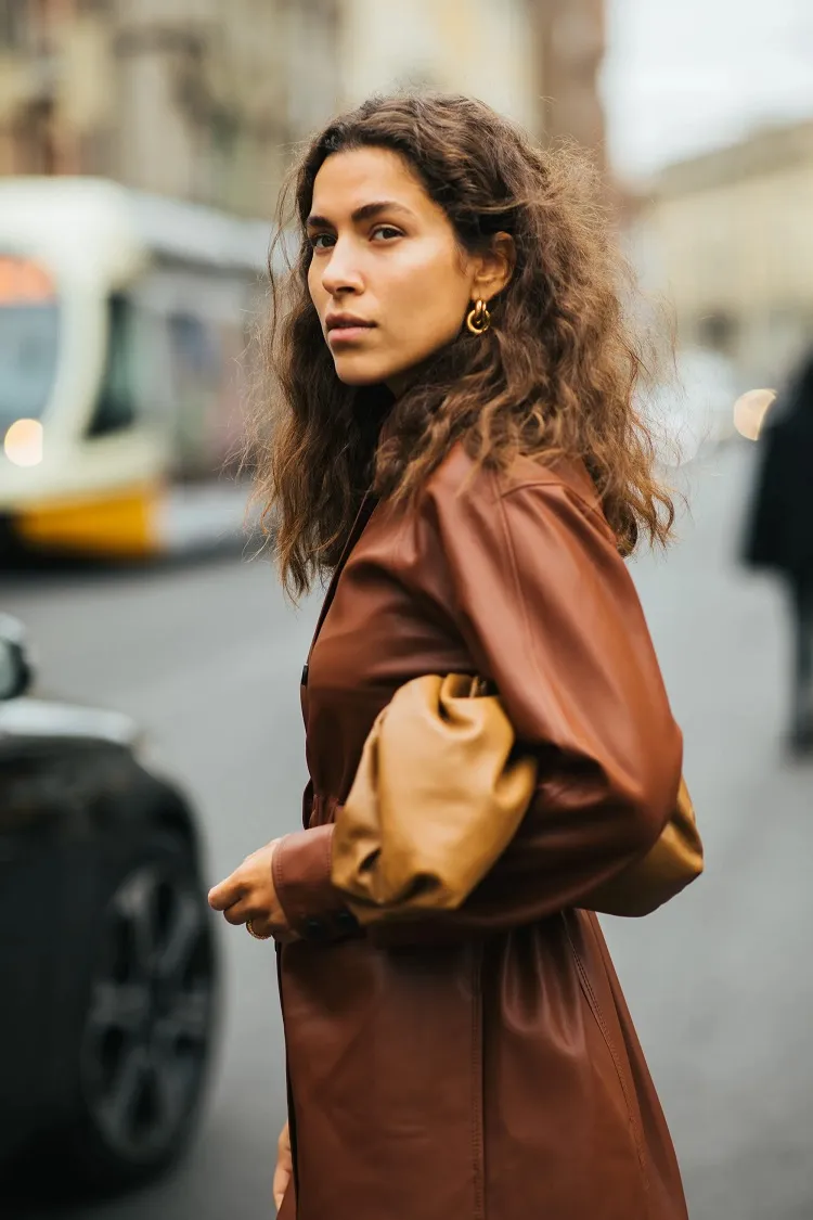 fashion week milan woman with a brown leather coat