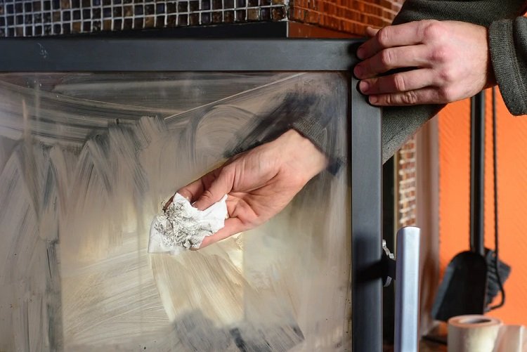 keep the fireplace glass clean