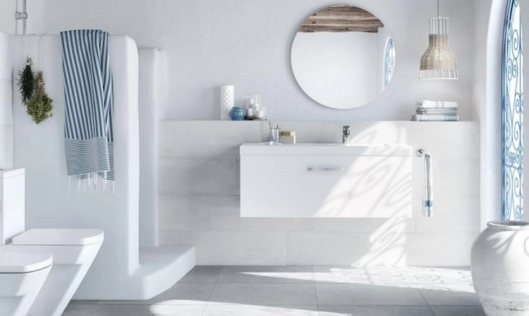 mediterranean bathroom in white with blue windows and accessories