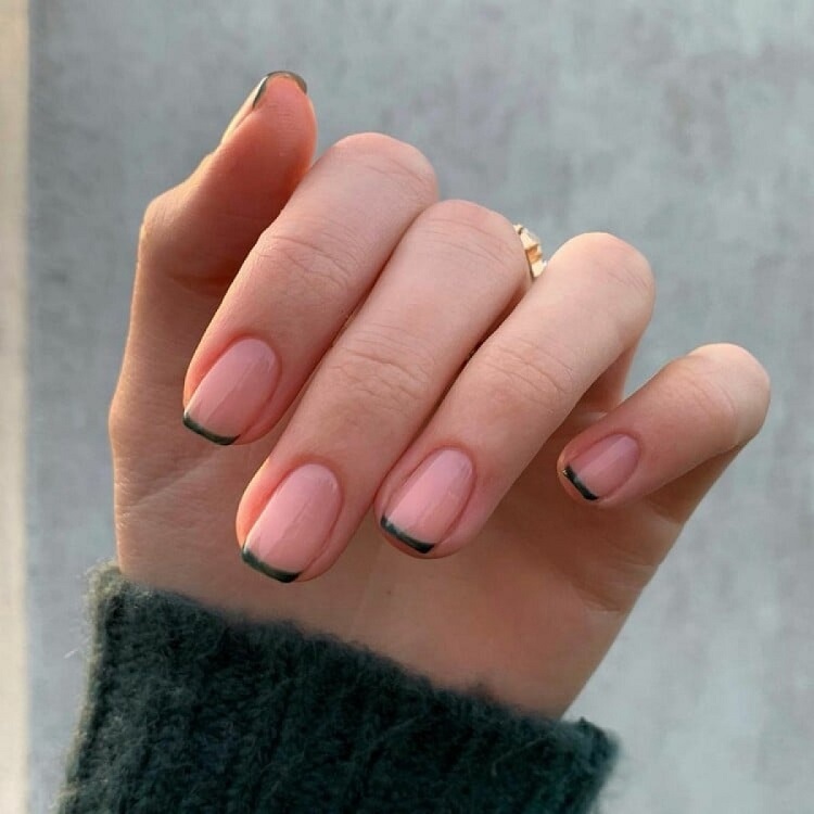 nail trend 2022 the nail tip is decorated with a thin line