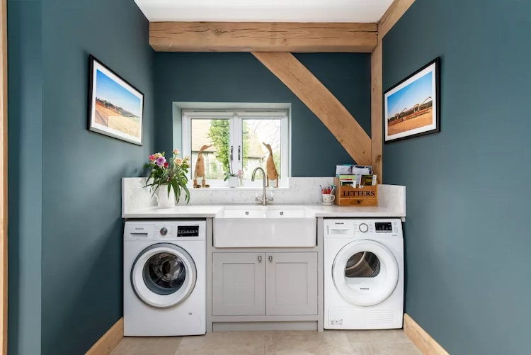 paint the walls in a matching color and design a utility room