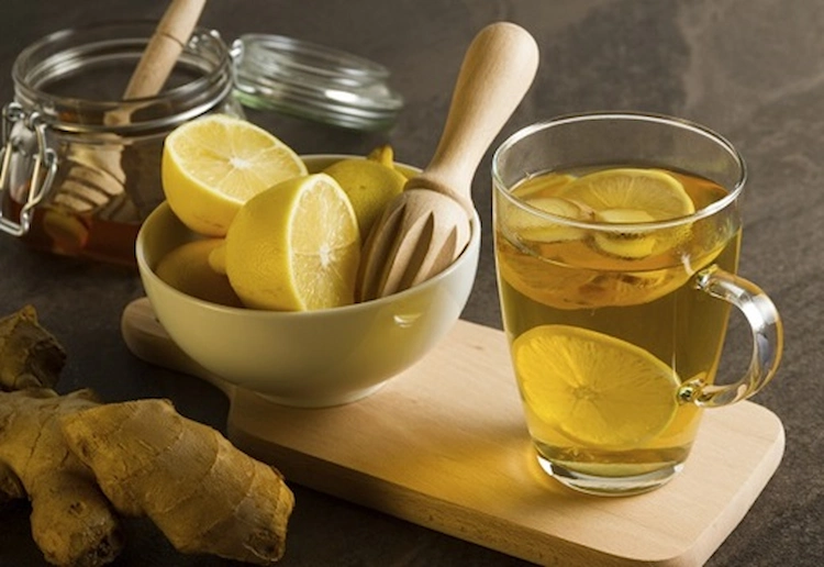 Combine lemon and ginger with tea