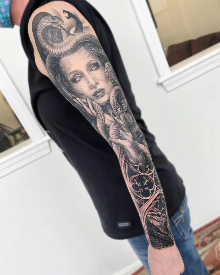 arm tattoo man medusa gorgon