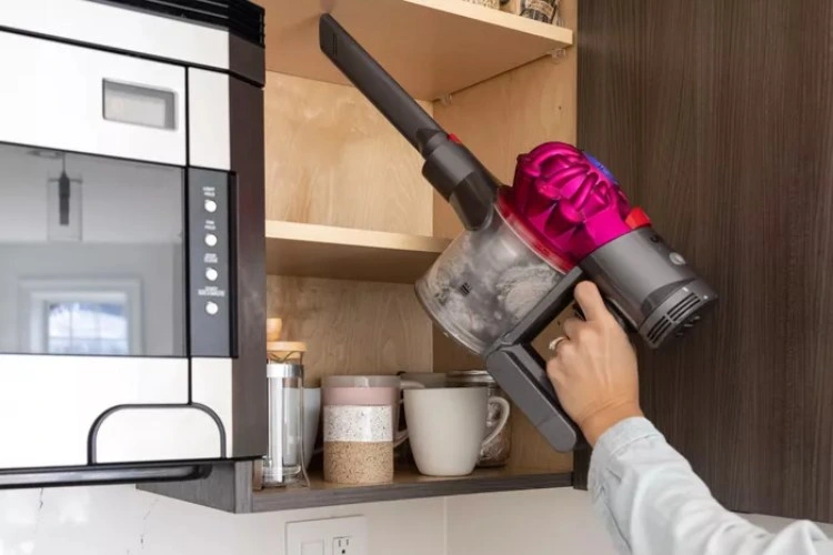 clean pantry cabinets with vacuum cleaner to get rid of flour moths