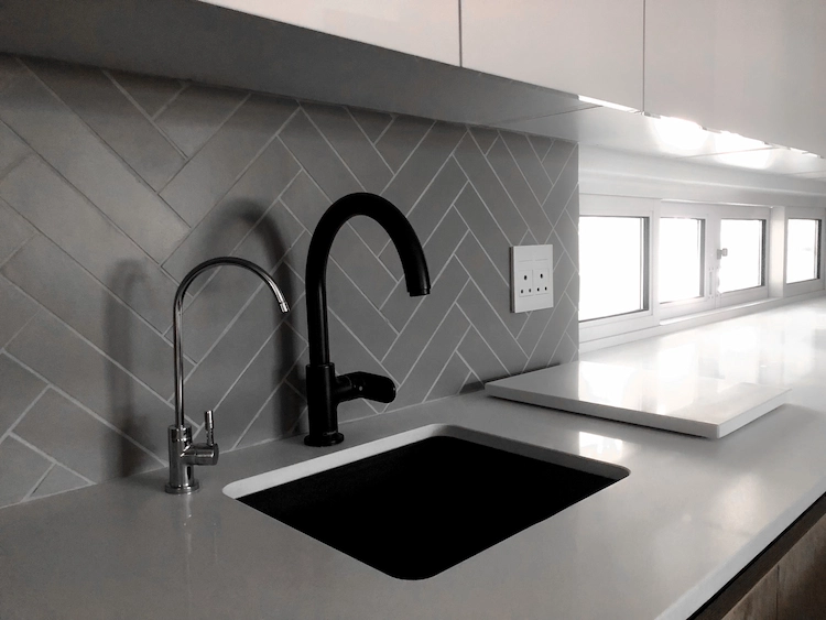 keep the kitchen tidy and clean matt surfaces and black faucets