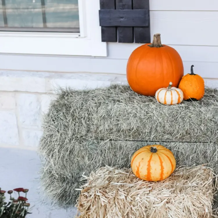 rustic decoration with grey hay bales on the porch