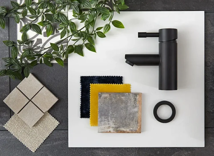 selection of modern materials and matt black faucets for bathrooms