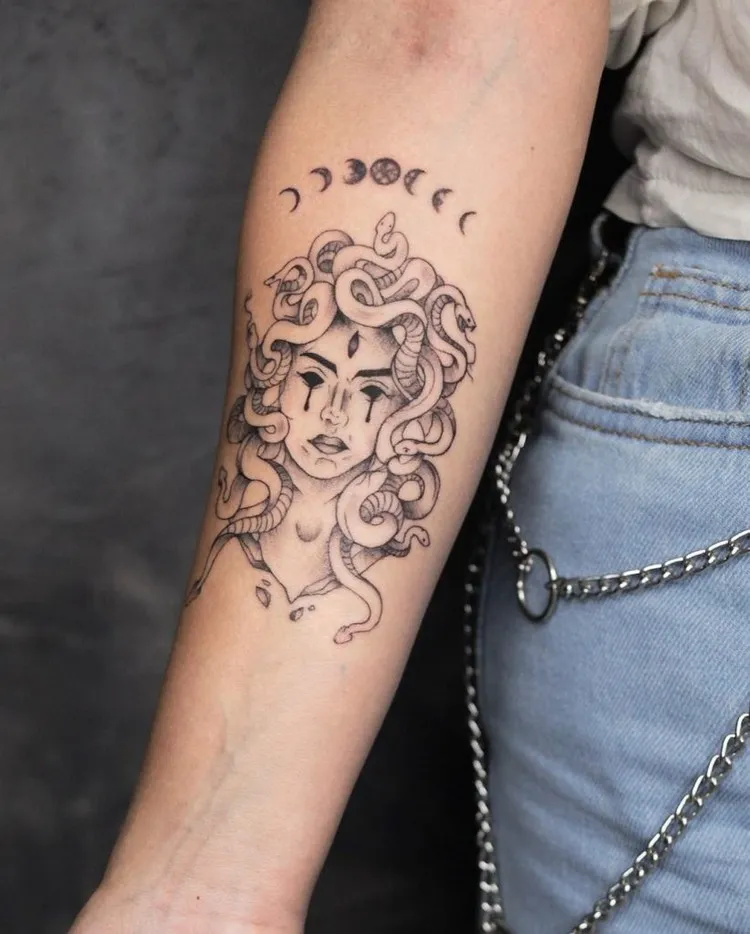 tattoo of Medusa woman forearm phases of the Moon
