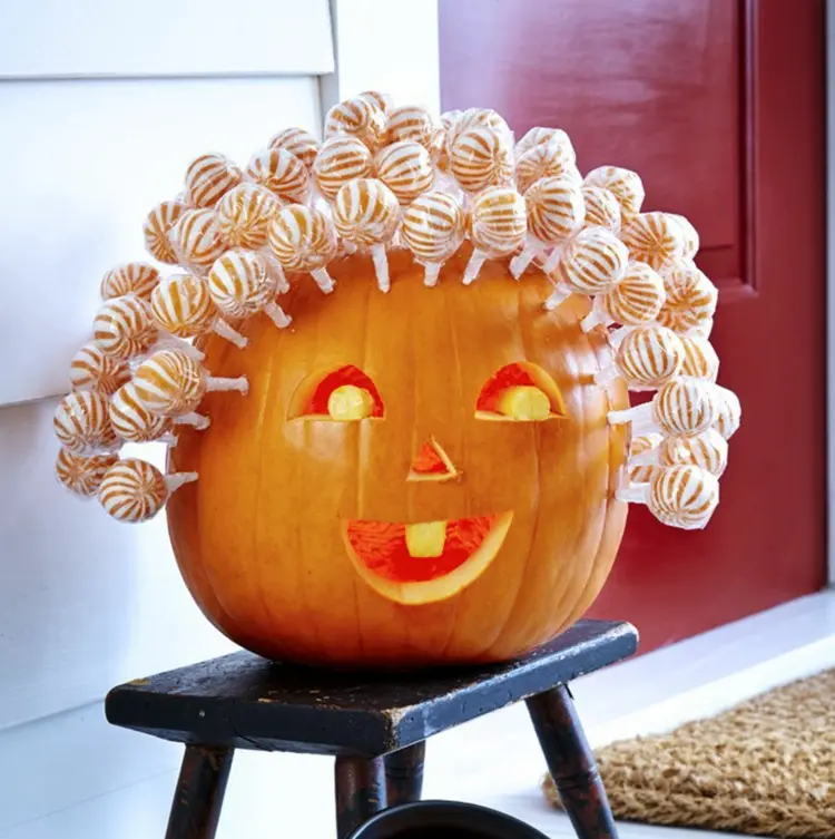 Cute pumpkin face and hair from lollipops