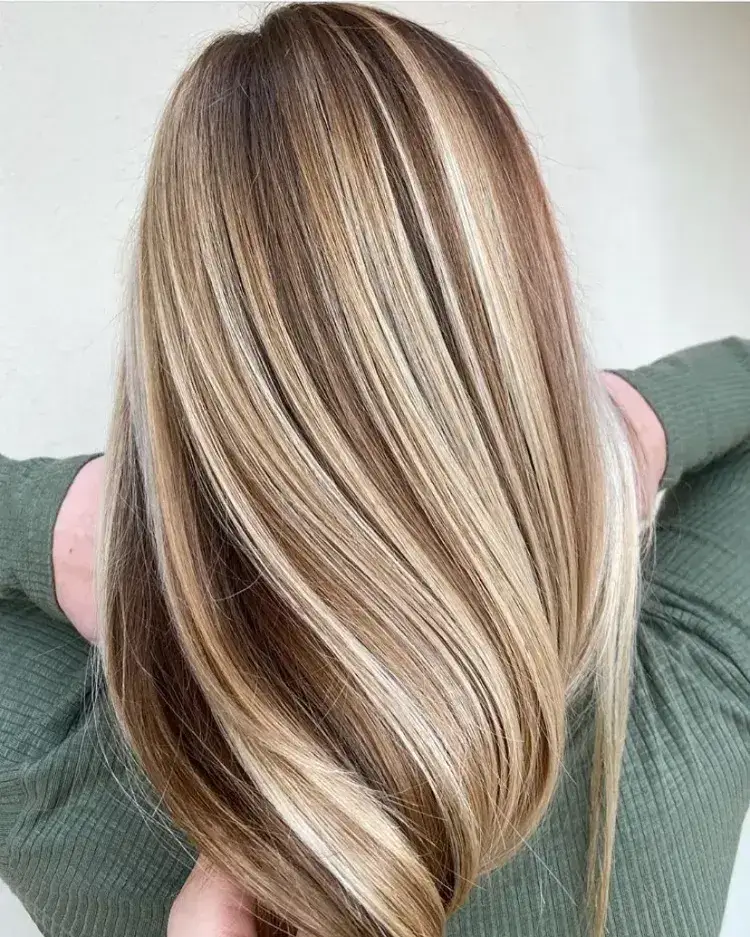 beautiful highlights blonde golden and caramel light smooth healthy hair