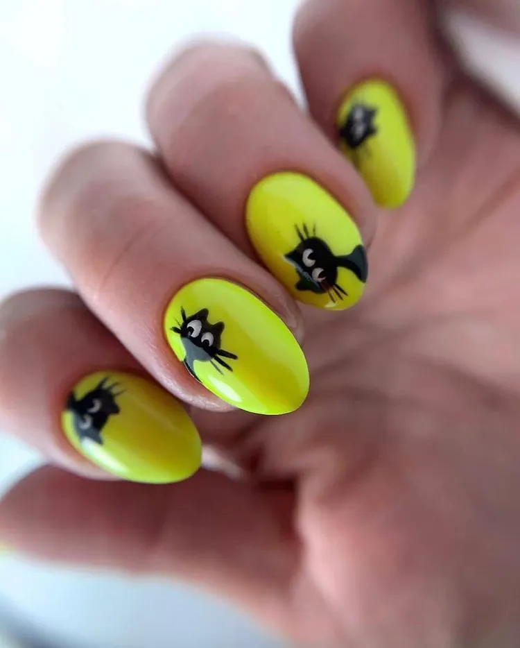 black cat nail art on neon nails