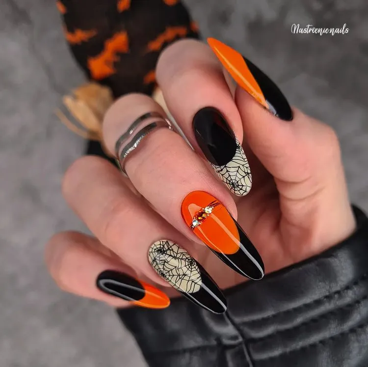 gel manicure halloween orange and black