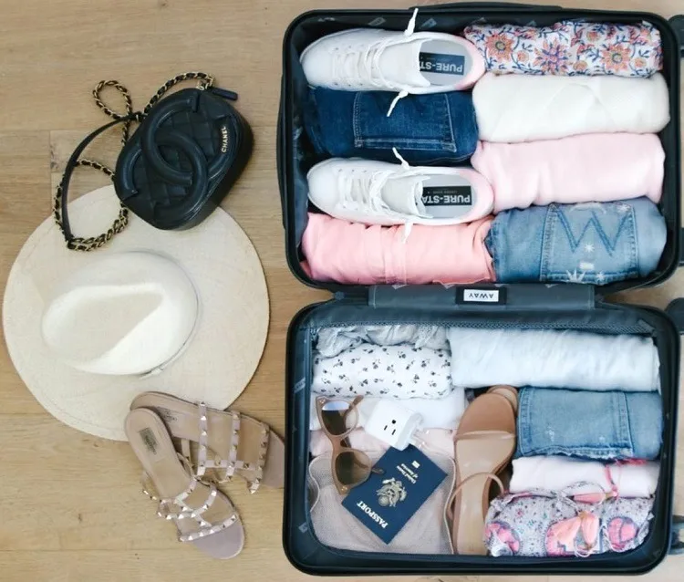 roll up clothes packing your suitcase tips and tricks easy save space and time