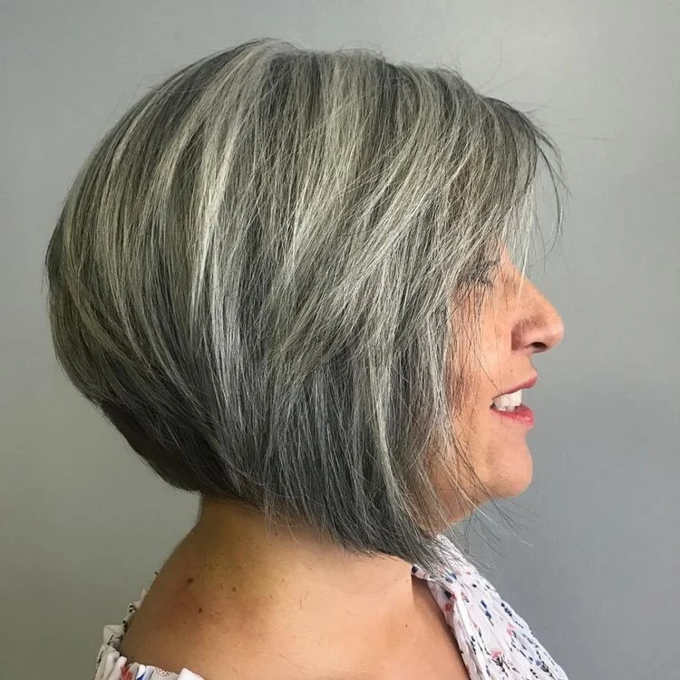 A line bob with bangs is perfect for women over 60