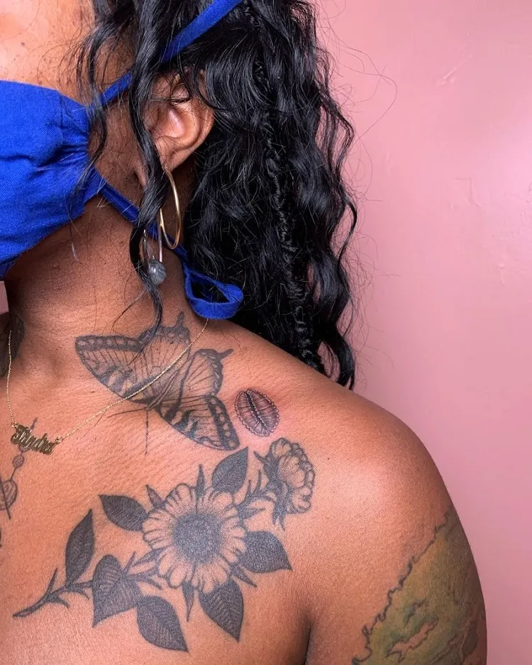 arm chest tattoo black woman dark skin