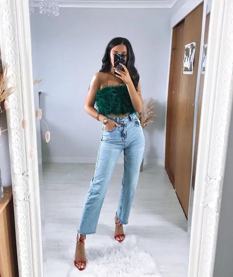 christmas green outfit fethers trendy in style for holiday party 2022 jeans casual