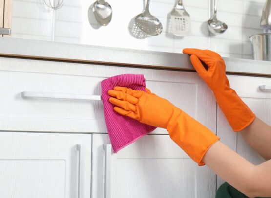 cleaning kitchen cabinets soft cloth gloves sponges cleaning solution