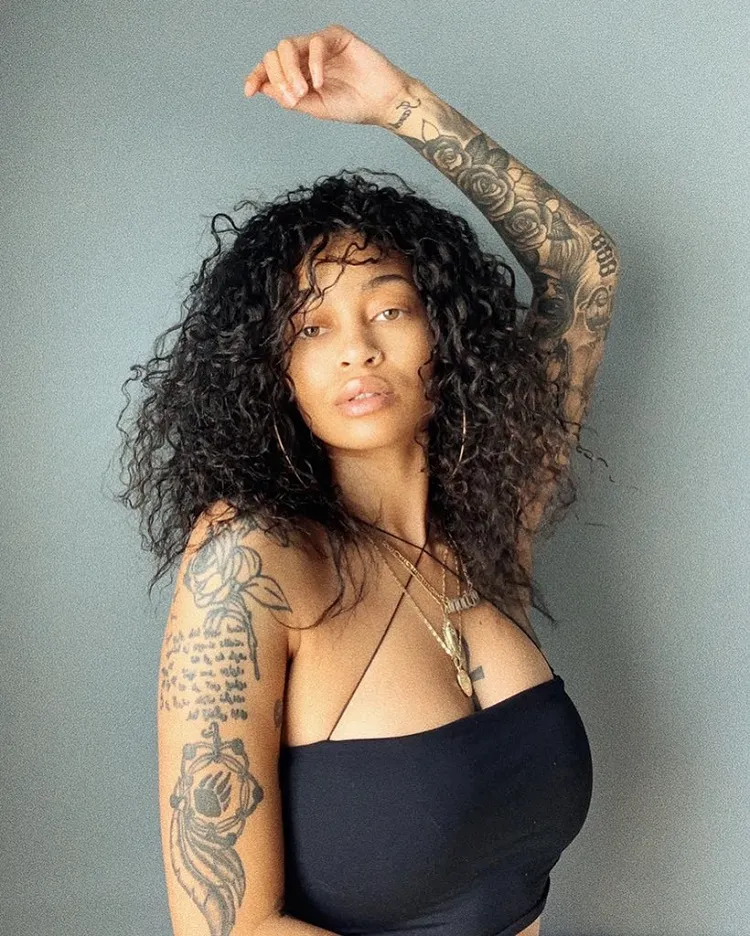 color tattoo on black skin women arm