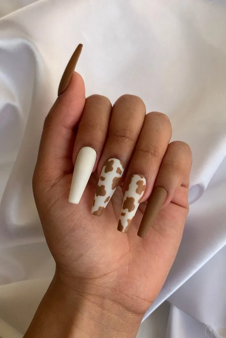 cow manicure in brown and white color
