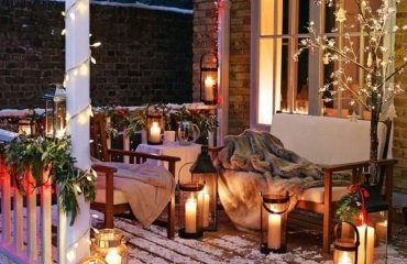 cozy blankets and lights on veranda cozy night christmas decorations 2022 how to decorate ideas