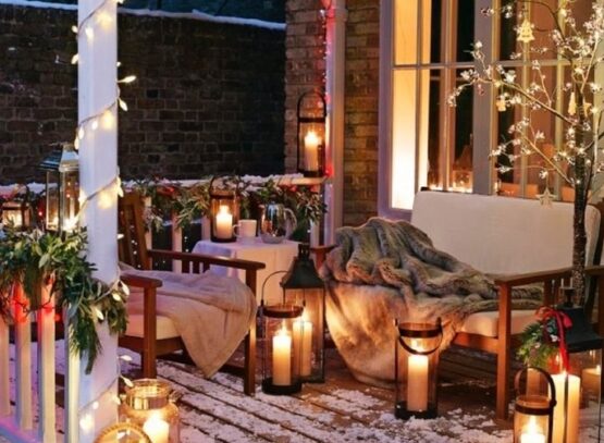 cozy blankets and lights on veranda cozy night christmas decorations 2022 how to decorate ideas