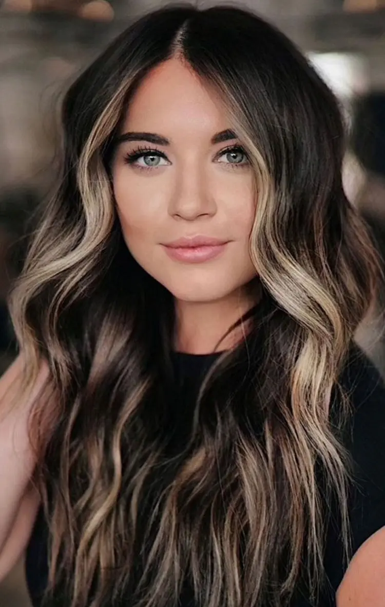 dark brown hair with face framing highlights 2022 hair trends how to style my hair