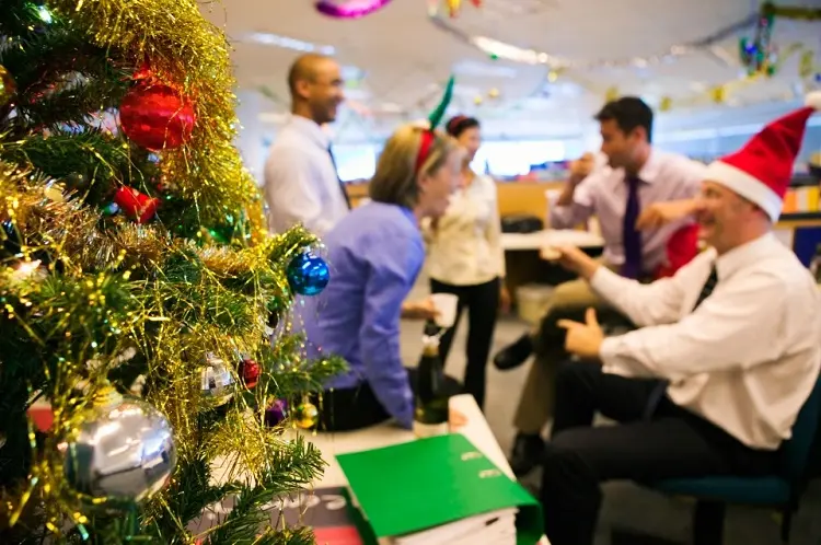 decorate the office for christmas with your co-workers get in the spirit holiday vibes