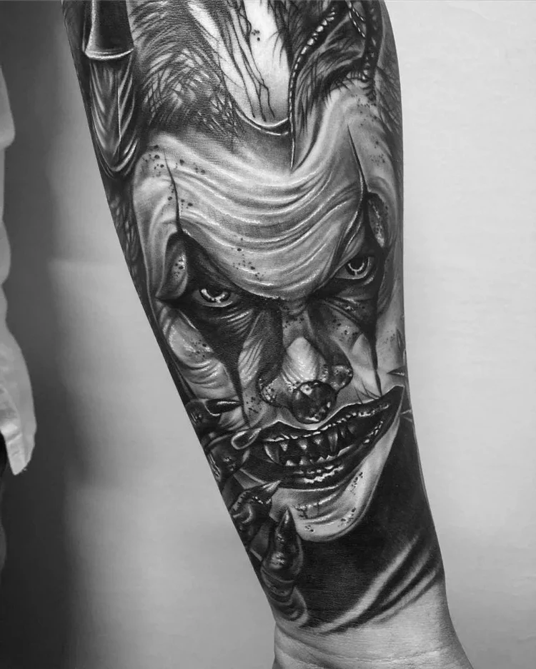 graphic joker tattoo forearm men