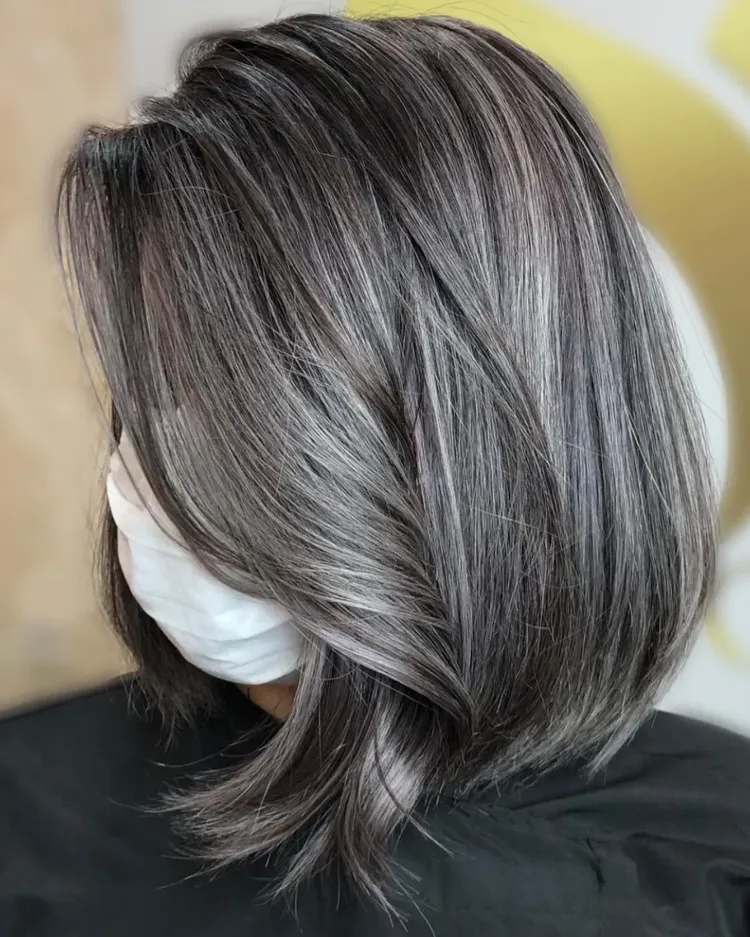 grey blending trend coloring white hair woman 60 years old salt and pepper hair balayage grey highlights maintenance