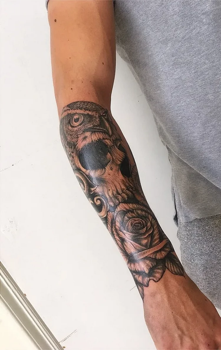 half sleeve tattoo men skull rose