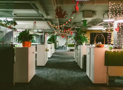 lights and ornaments on the sealing christmas decoration at the office ideas colorful santa snowman