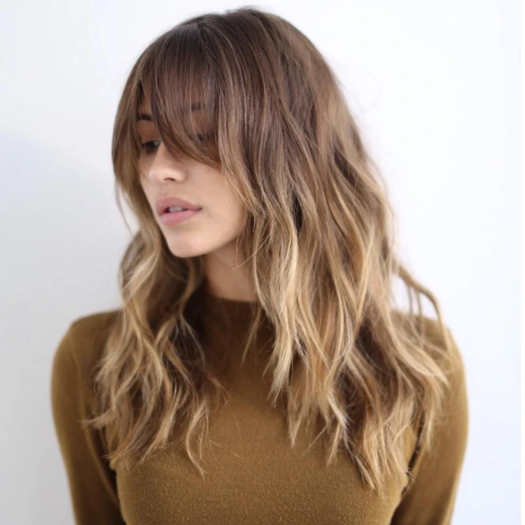 messy ombre layered hairstyle with bangs
