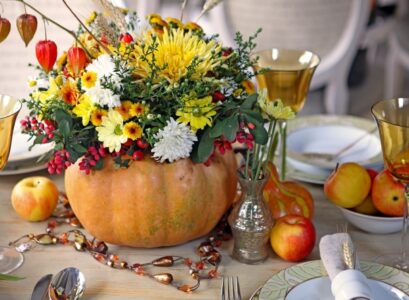 pumpkin vase floral arrangement for Thanksgiving table decor