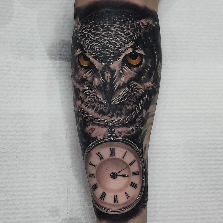 tattoo clock and owl man forearm