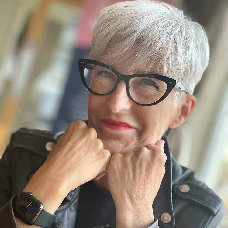 white haircut woman with glasses pixie cut with long bangs trendy haircut 2022