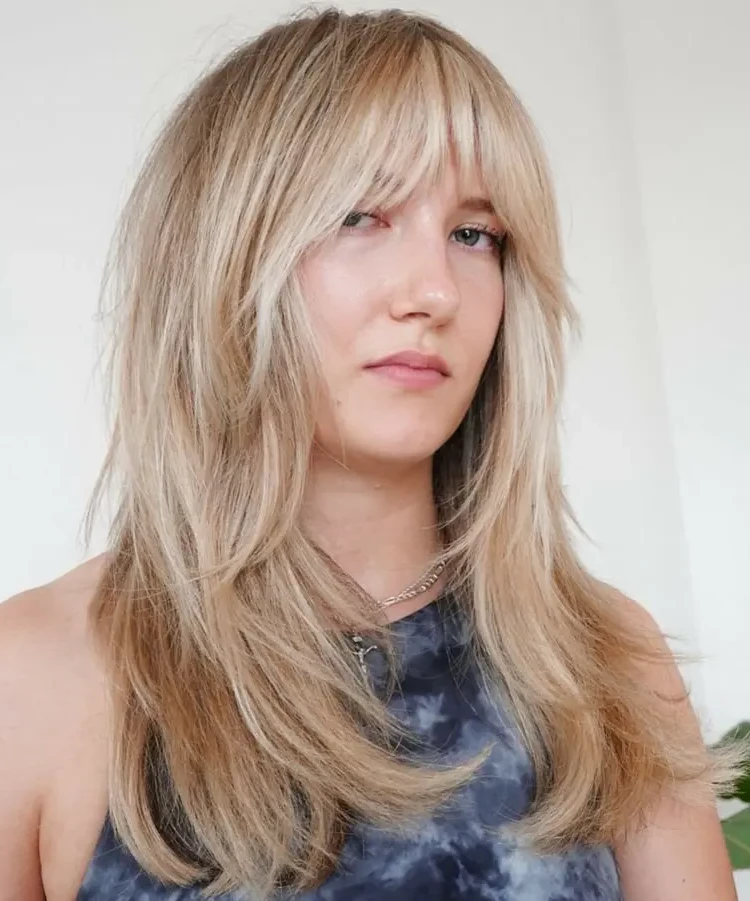 Bottleneck bangs look especially good with long layered hair