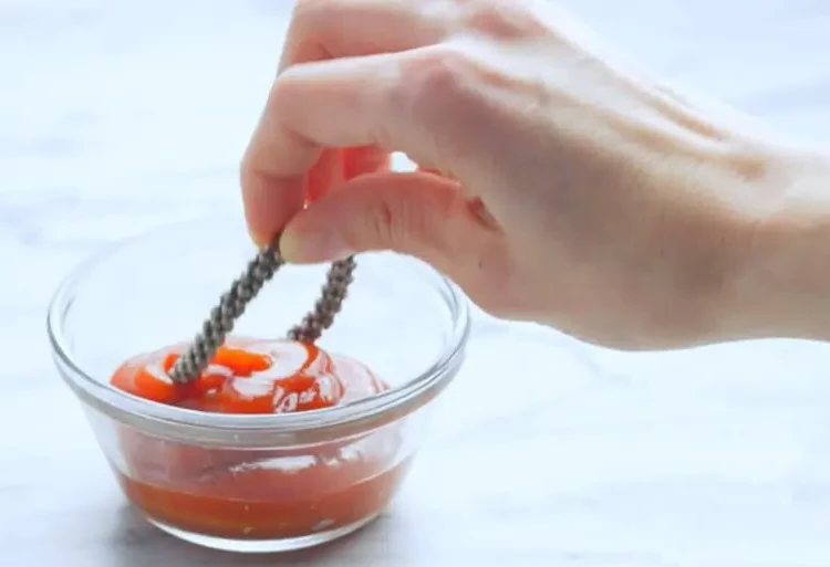 Clean silver bracelet with ketchup