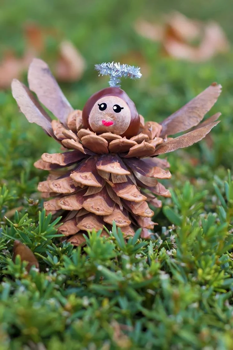 Cute Christmas Angel made of cone chestnut and maple seed
