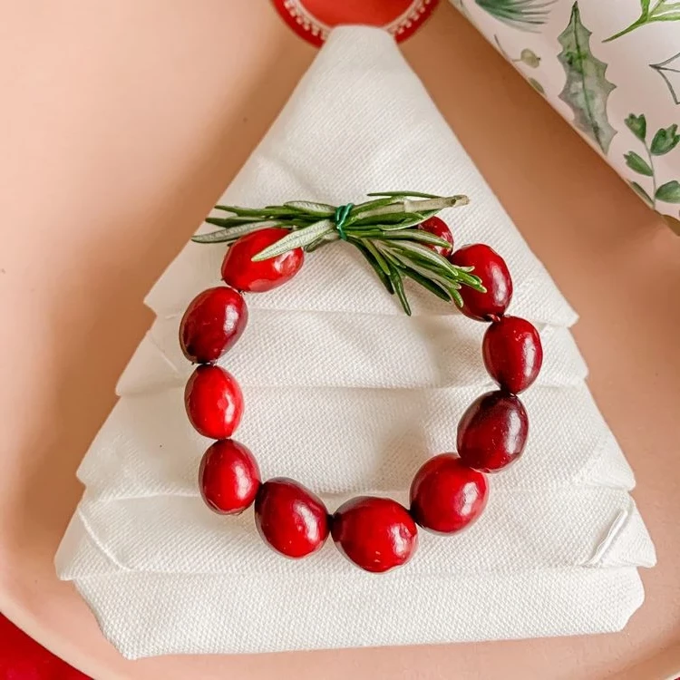 DIY Christmas napkin rings with cranberries and rosemary