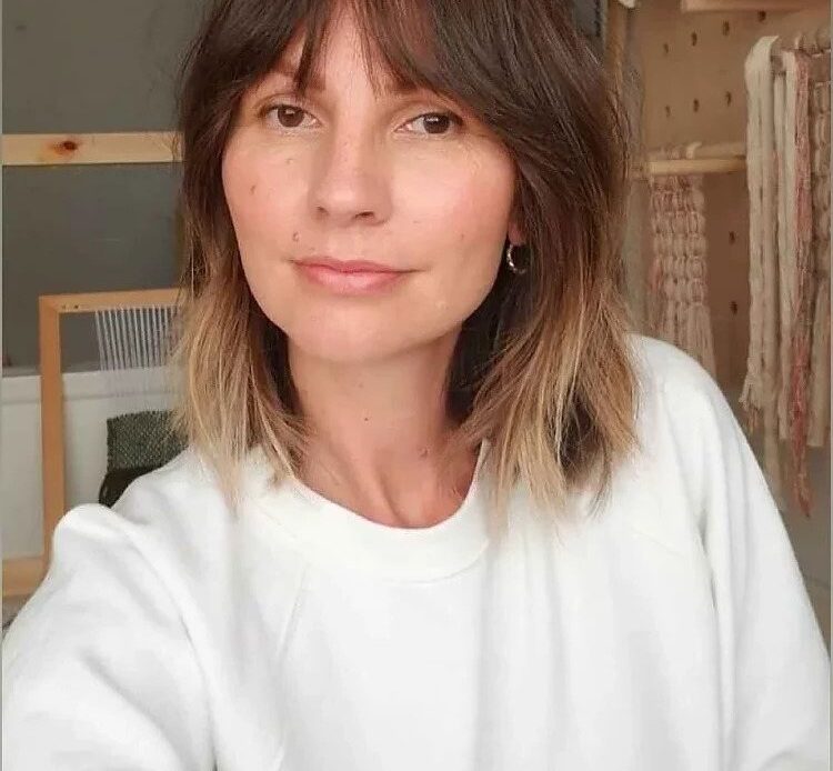 Fashion-and-style-at-50-how-to-wear-the-long-bob-with-curtain-bangs-to-look-younger