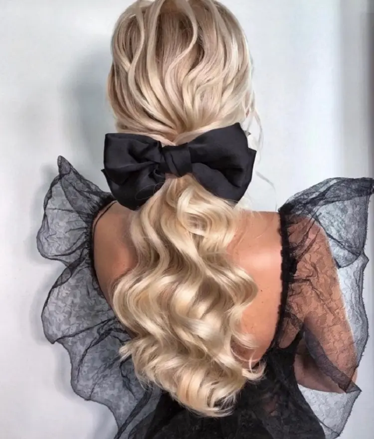 bow hairstyle new years eve hair cut blonde curly