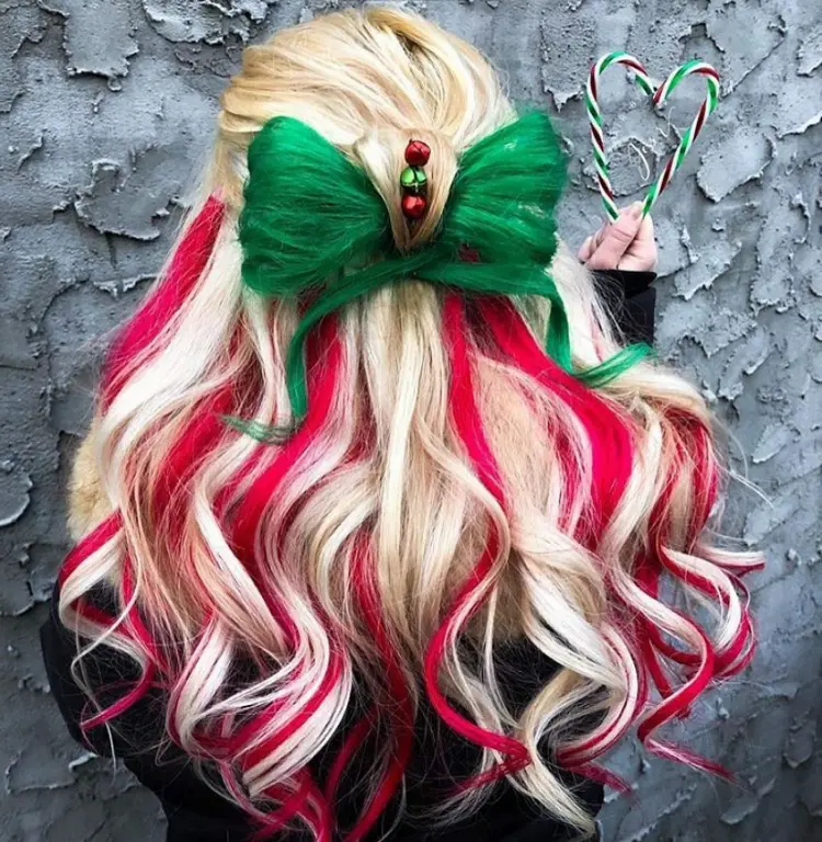candy cane hairstyle holiday inspired look long blonde hair red and green hair extensions