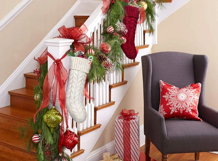 christmas stair decorating pine branches ball ornaments stockings gifts cushion