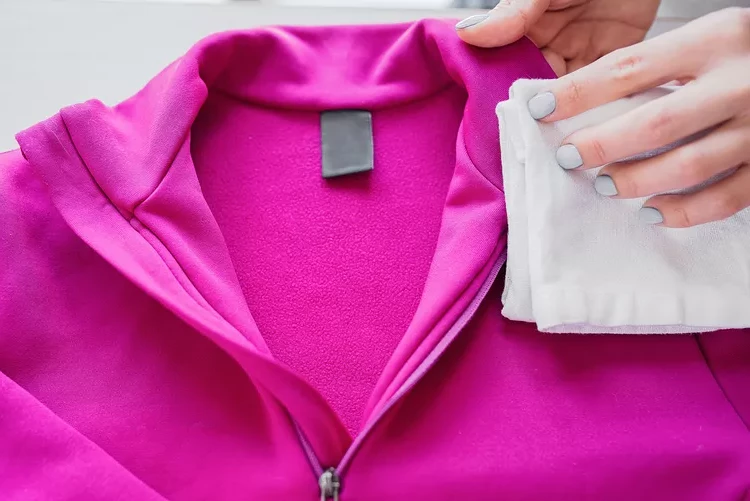 cleaning fleece with a cloth to protect the fabric from damage
