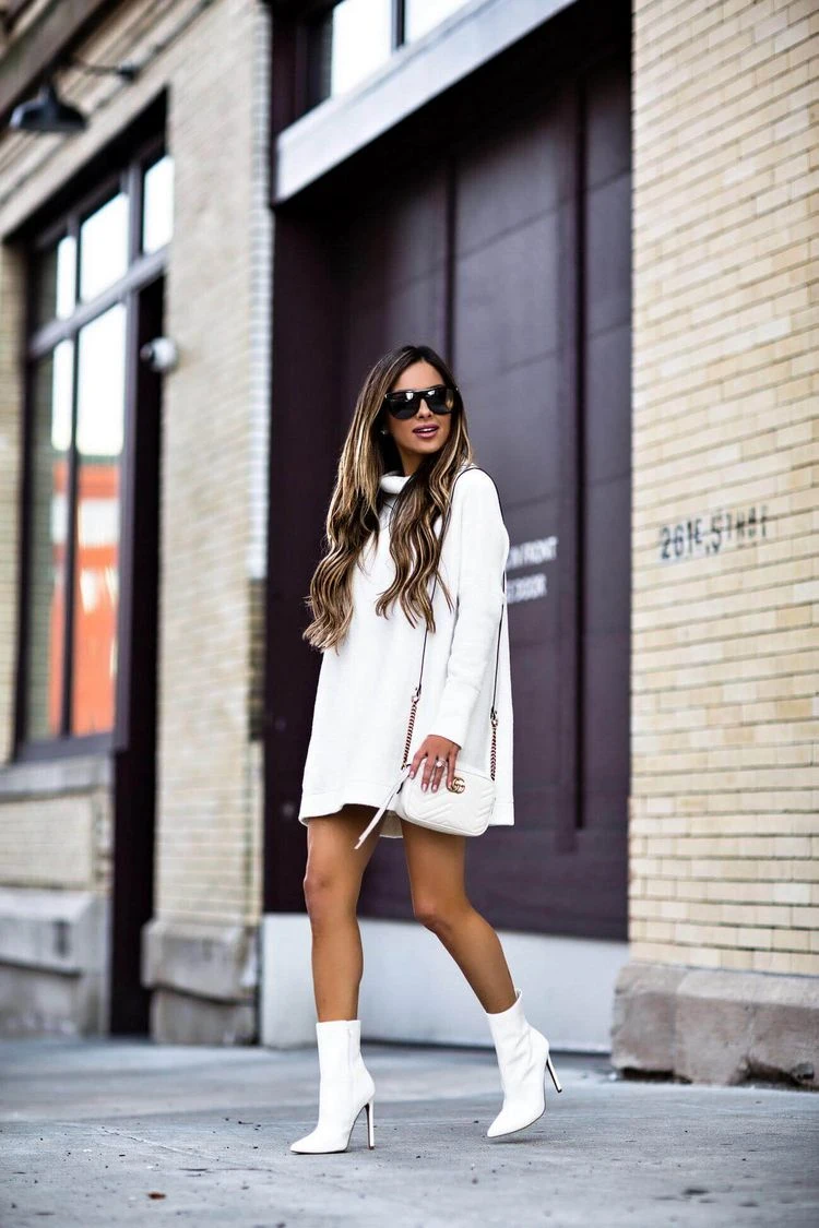 combine white boots with a matching handbag