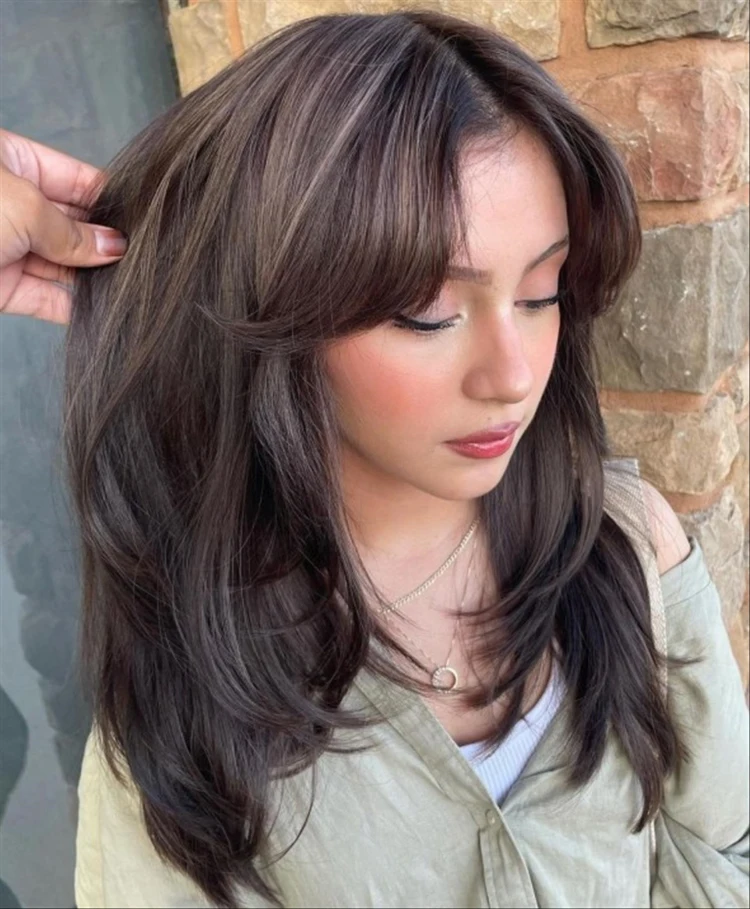 curled curtain bangs natural hair color hairstyling