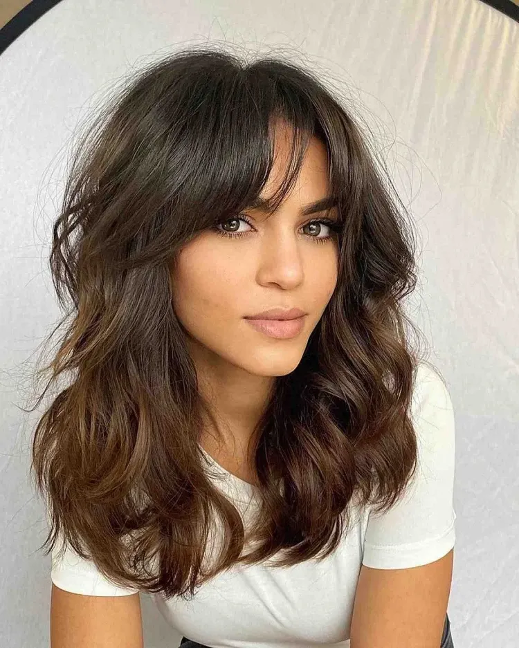 cute hairstyle idea for women beautiful curls fringe layers